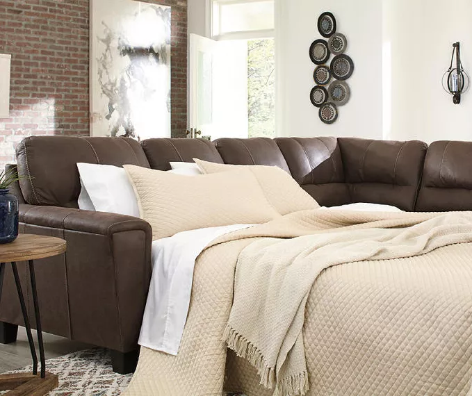 Signature Design By Ashley Navi Chestnut Faux Leather Sleeper Sectional With Right-Facing Chaise